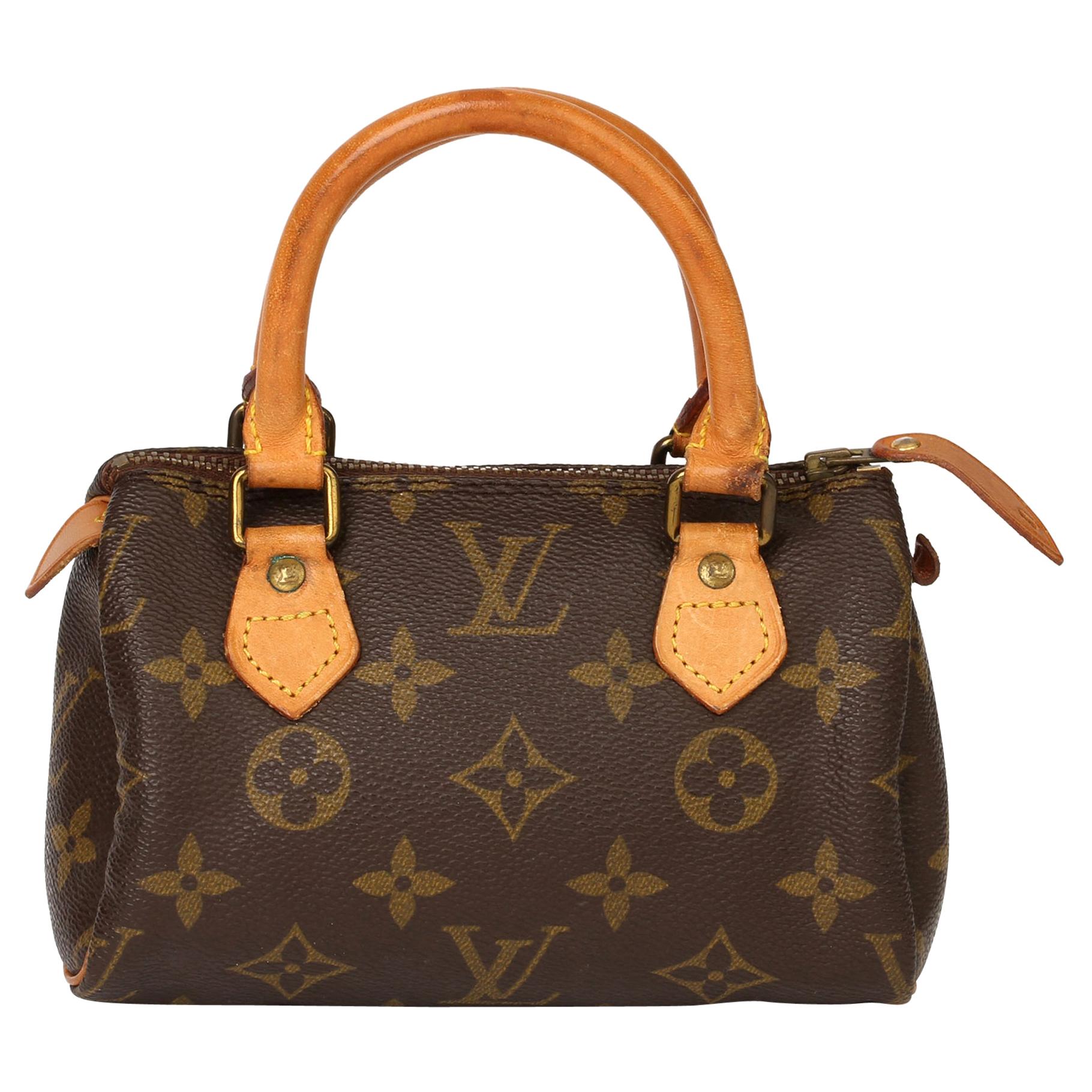 Louis Vuitton Brown Monogram Vintage Mini HL Speedy at 1stDibs  louis  vuitton mini hl speedy bag, vintage louis vuitton speedy, vintage louis  vuitton mini speedy