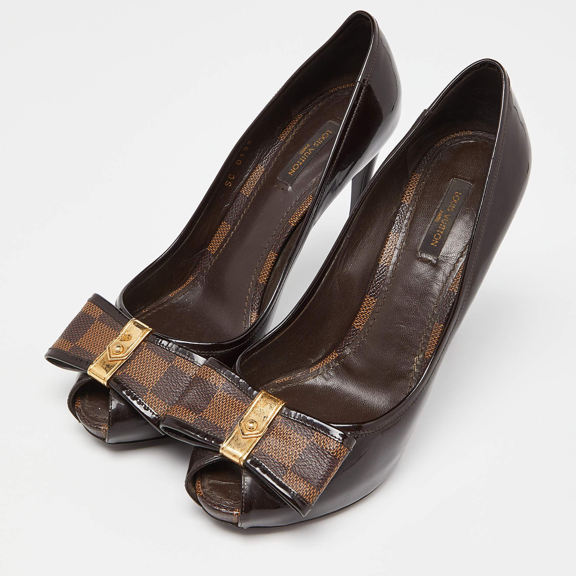 Exhibit an elegant style with this pair of pumps. These LV peep-toe shoes for women are crafted from quality materials. They are set on durable soles and sleek heels.

