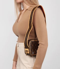 Louis Vuitton Brown Perforated Monogram Coated Canvas, Fuschia Mini Trocadero