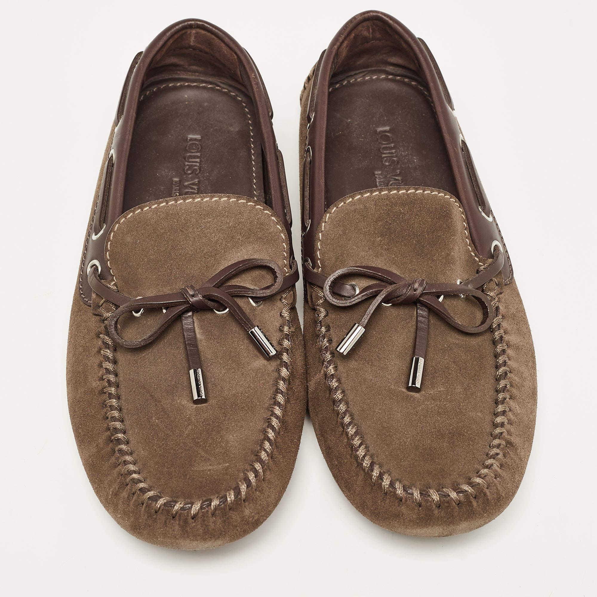 These designer loafers by Louis Vuitton will be your favorite go-to pair for off-duty looks. Crafted using suede & leather, the shoes have little ties on the uppers.

