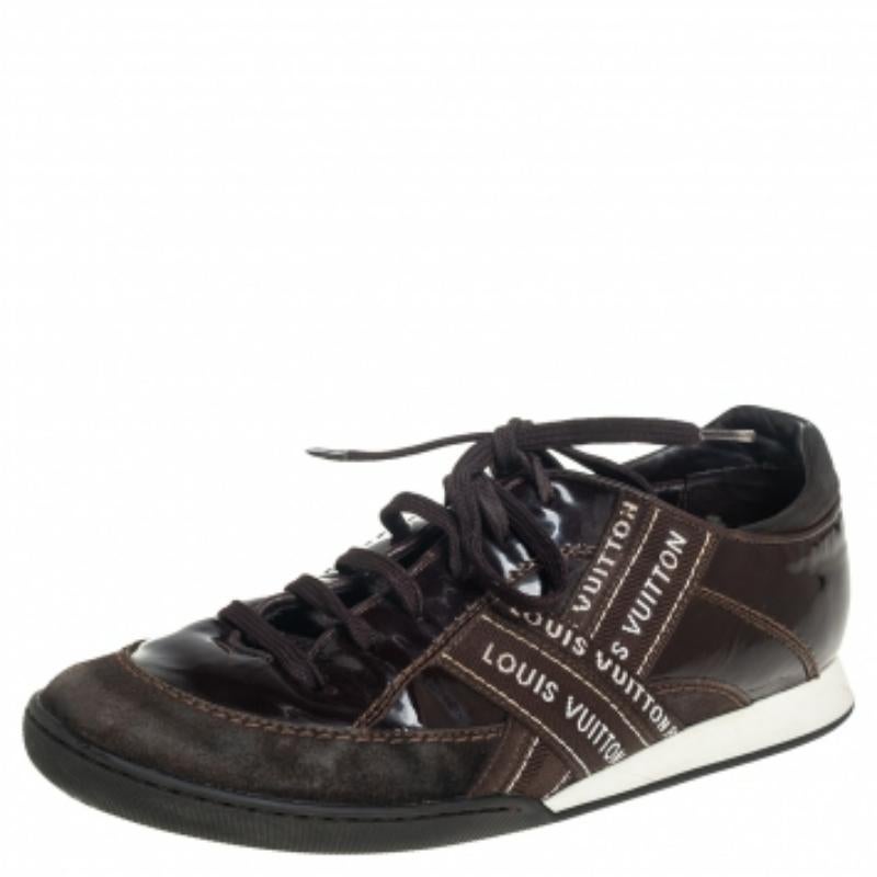 Stylish, sporty, and luxe, these Louis Vuitton sneakers come in a low-top profile. Crafted from suede and patent leather, they are adorned with the label's name on the sides and laced-up vamps.