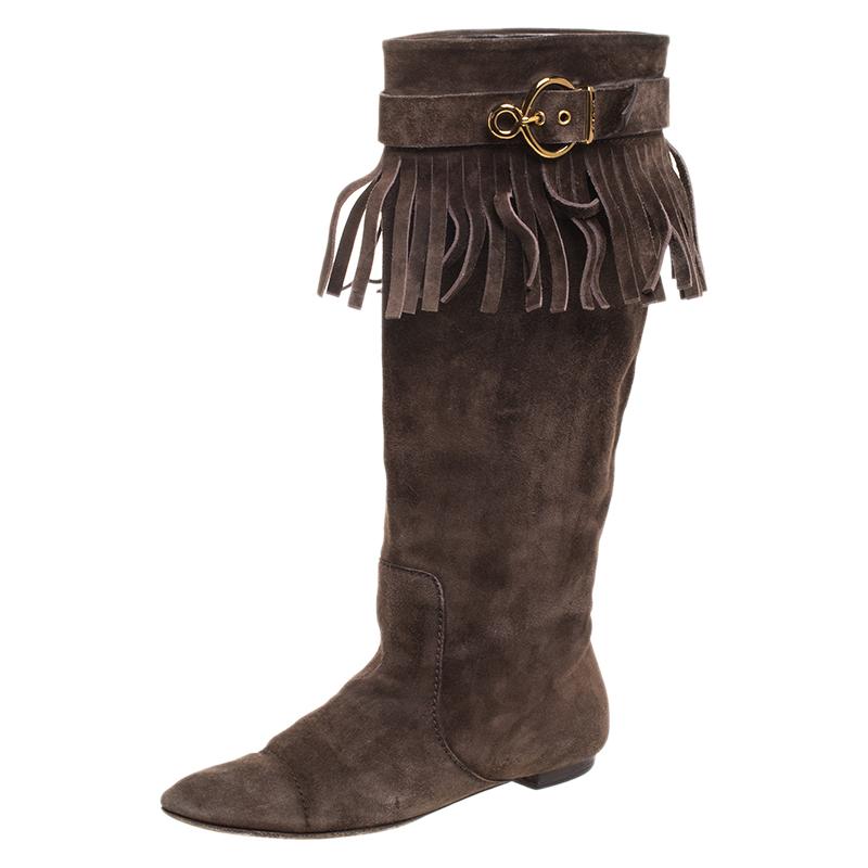 These impressive pair of boots have been crafted out of soft suede. The leather-soled boots are just what you need to lift your style quotient. A pair of impressive boots like this, from the house of Louis Vuitton, offers quality like none other.