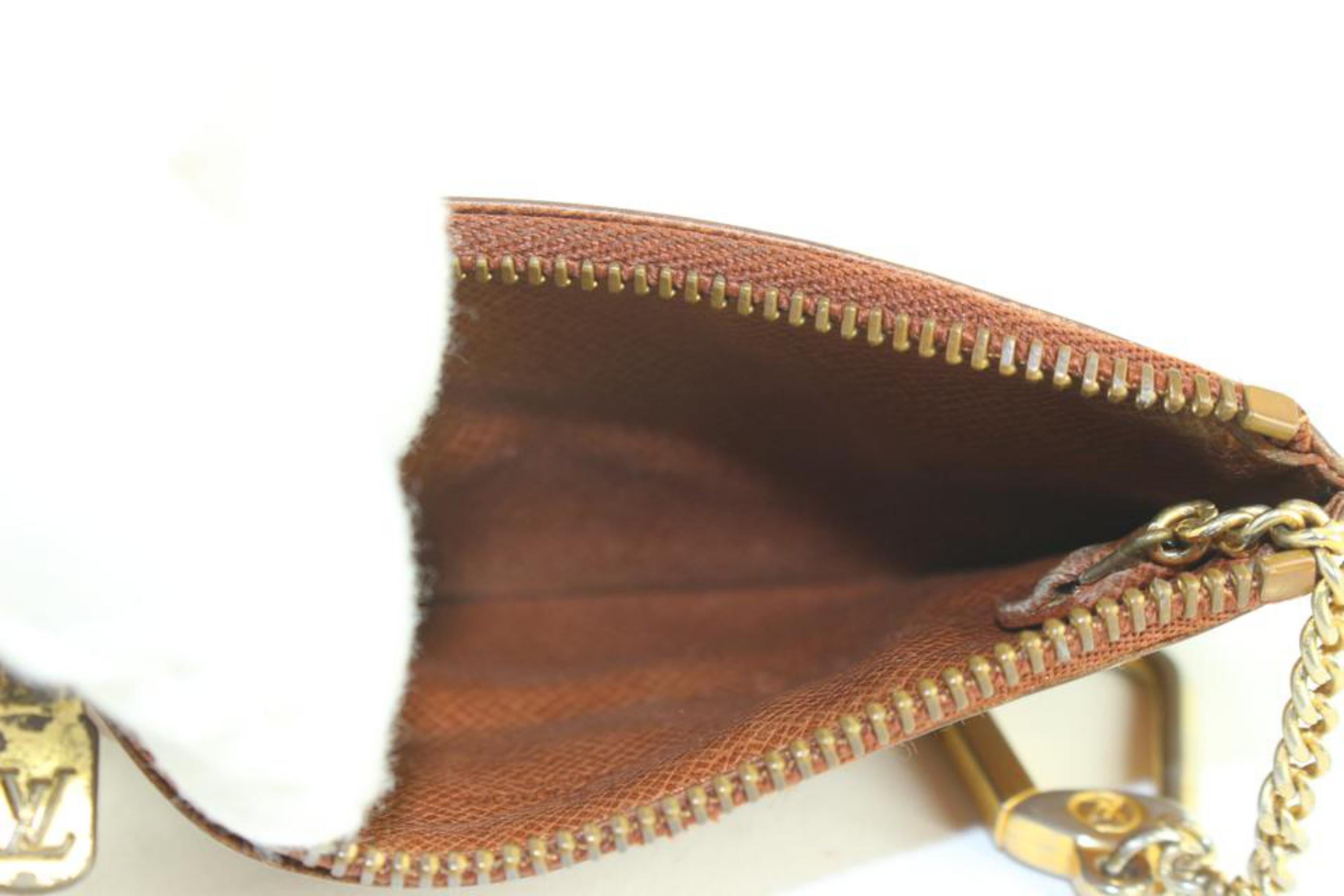 Louis Vuitton - Porte-clés en cuir marron Taiga 13lv1103 en vente 5