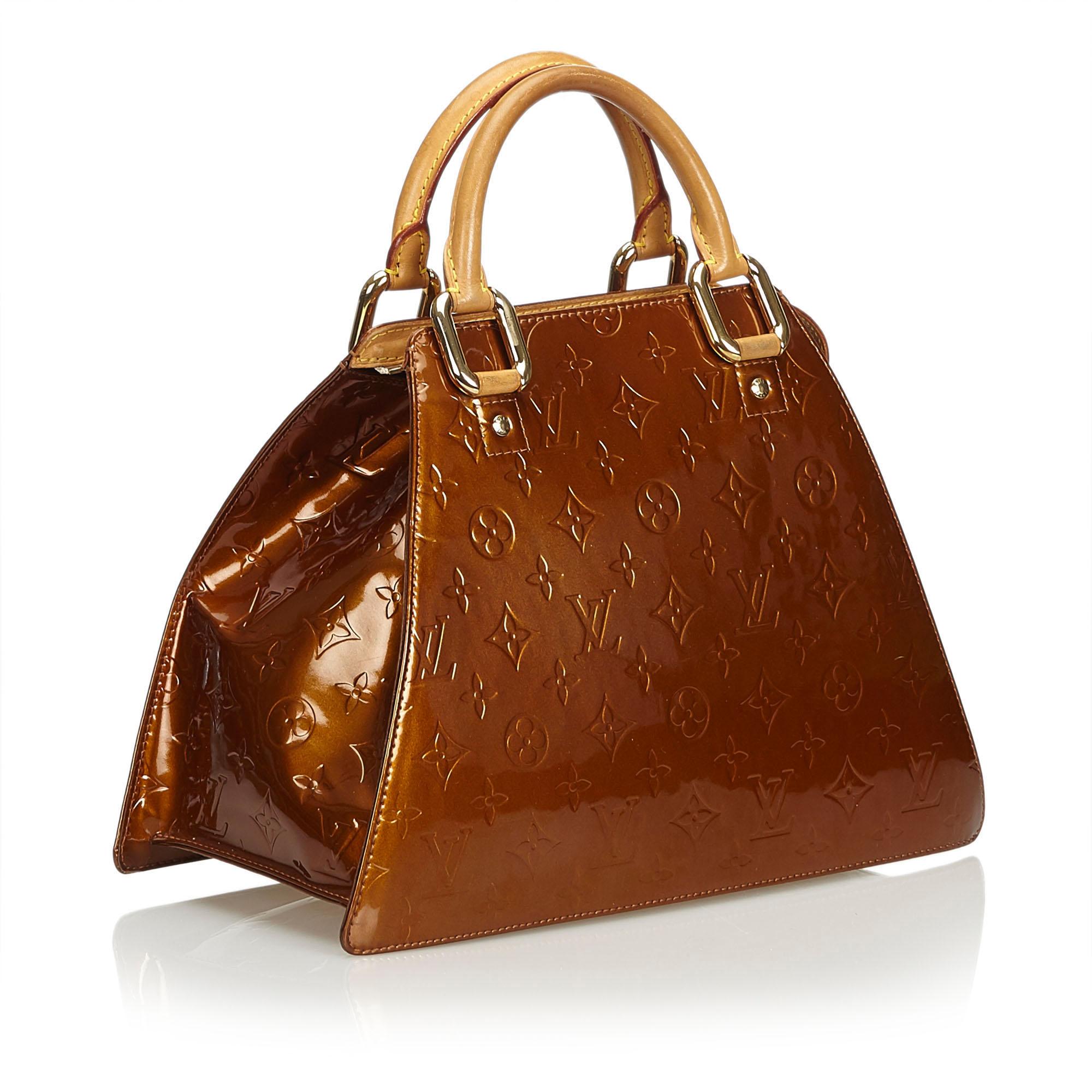 The Forsyth features a vernis leather body, rolled handles, a top zip closure, and an interior slip pocket. It carries as B+ condition rating.

Inclusions: 
This item does not come with inclusions.


Louis Vuitton pieces do not come with an