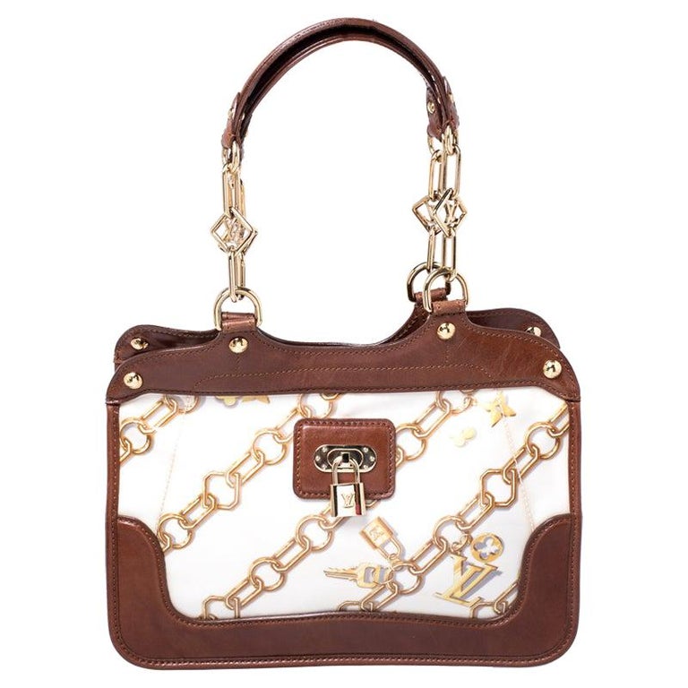 Louis Vuitton Brown/White Monogram Coated Canvas Linda Charms Bag For Sale at 1stdibs