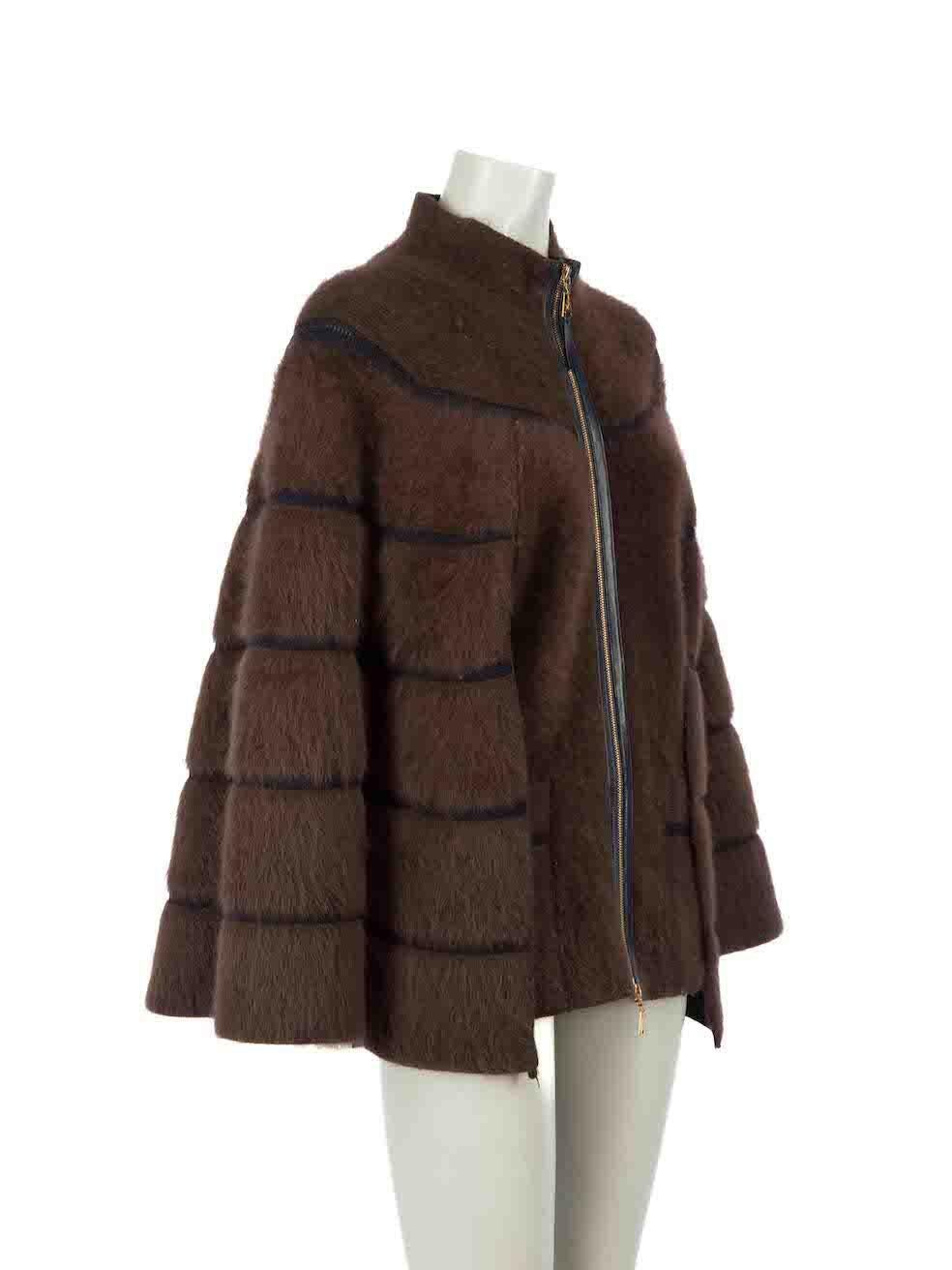 CONDITION is Very good. Minimal wear to coat is evident. Minor pilling to overall wool material especially to the edges. The zip hardware is slightly tarnished on this used Louis Vuitton designer resale item.
 
Details
Brown
Wool
Cape
Striped