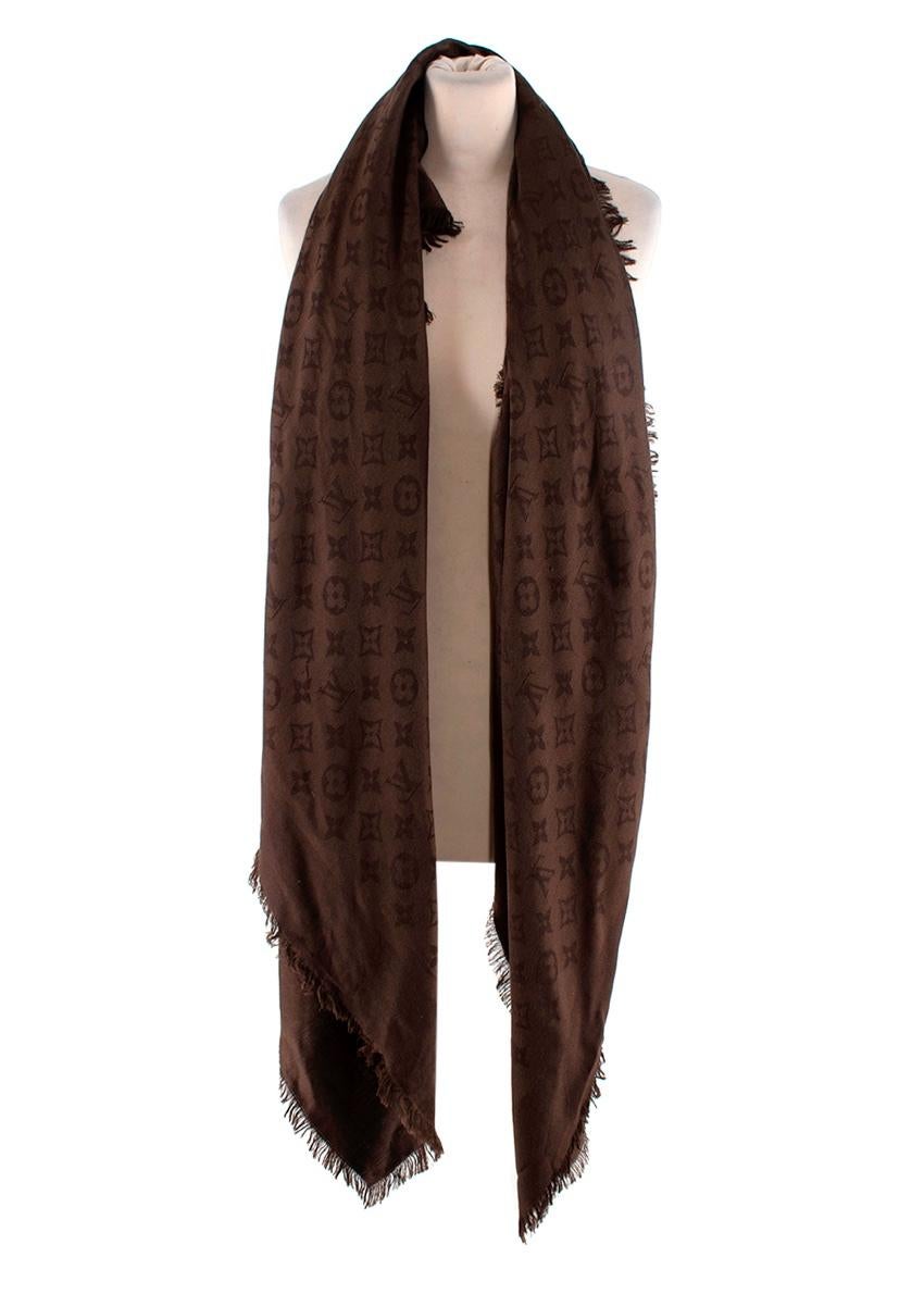 Louis Vuitton Brown Wool & Silk Monogram Shawl
 
 
 
 Ideal for everyday use, this luxuriously soft Monogram shawl is subtle and very feminine. Entirely printed with the Monogram pattern, it features the Louis Vuitton signature.
 
 
 
 - Luxurious