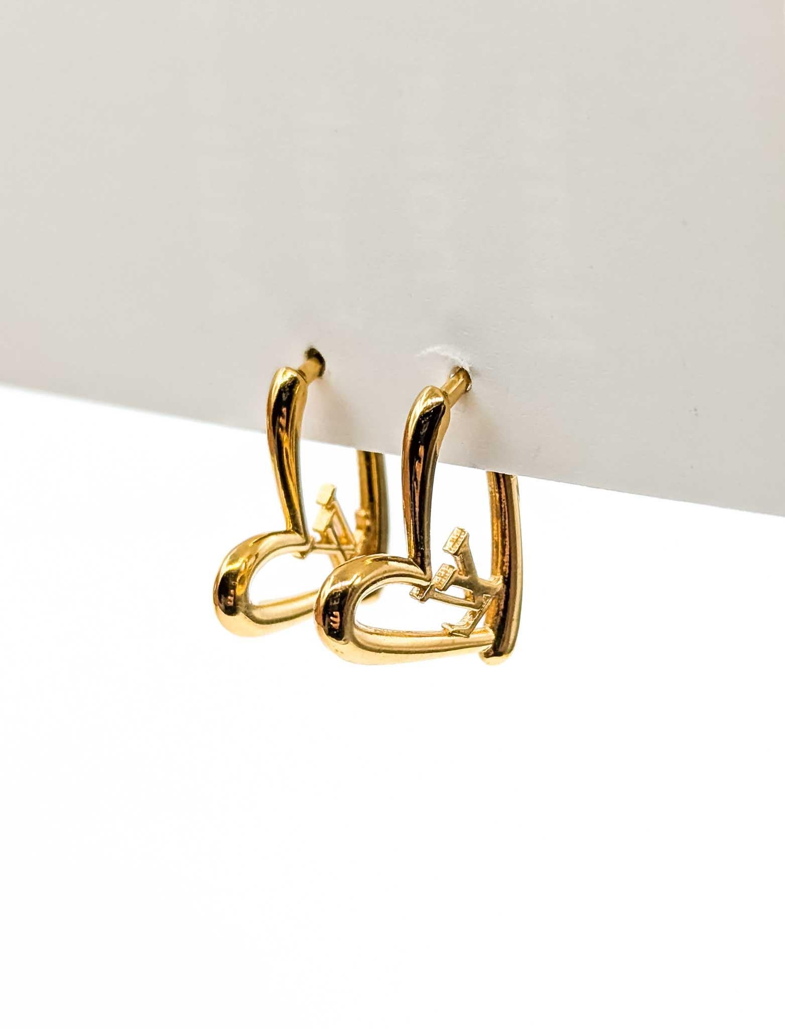 Discover timeless elegance with our Vintage Louis Vuitton Jewelry Collection. Elevate your style with these exquisite earrings that capture the essence of luxury and sophistication. Perfect for any occasion, these earrings are a testament to
