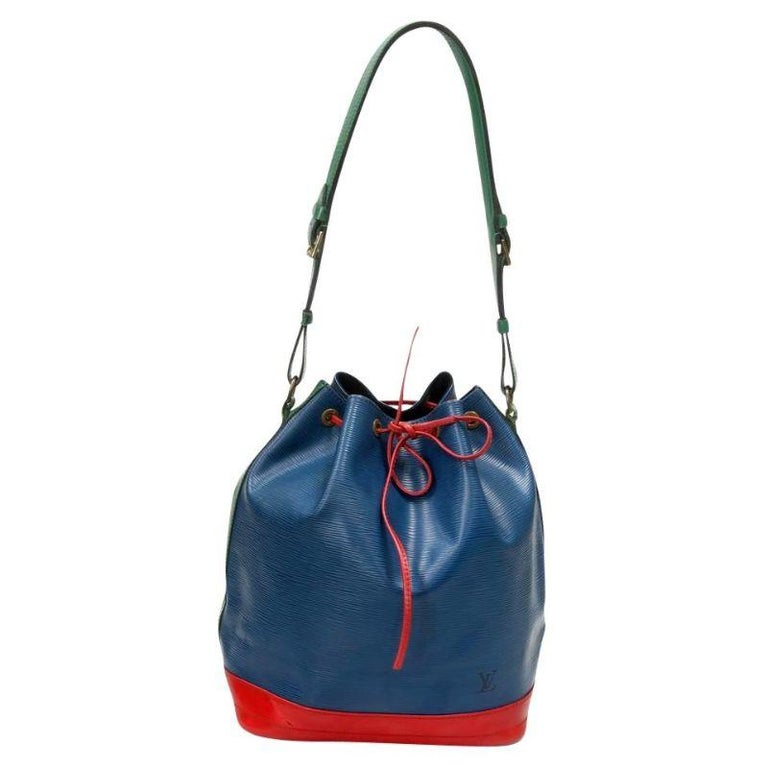 Louis Vuitton Bucket Noé Vintage Blue Green Red Epi Leather Shoulder Bag

This authentic Louis Vuitton Vintage Noe bag is a classic daytime carry-all that never fades from being fashionable. Epi leather arranged in a variety of complementing hues