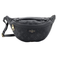 PRELOVED Louis Vuitton Monogram Discovery Bum Bag MI3230 051023