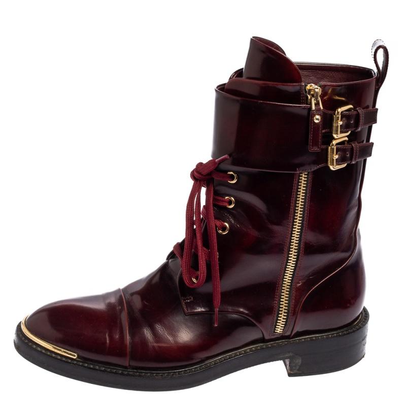 You will always be style-ready when you flaunt these gorgeous Ranger boots by Louis Vuitton. Crafted from leather, they feature a lace-up front, zip details, and comfortable insoles. They've been beautified with gold-tone accents and a belted top.
