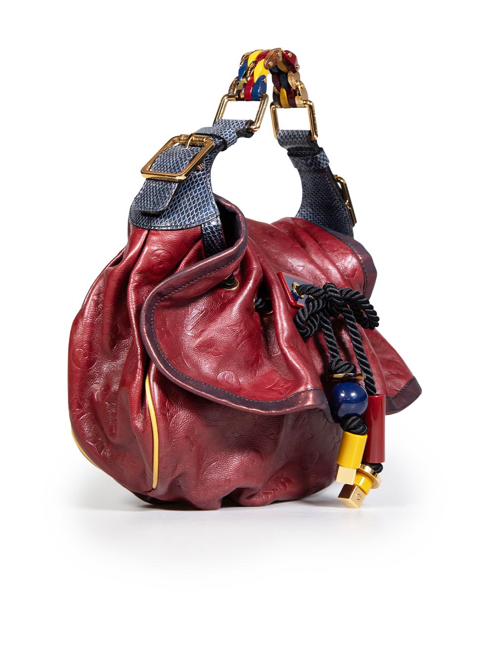 CONDITION is Very good. Hardly any visible wear to bag is evident on this used Louis Vuitton designer resale item. The item comes with a dust bag.
 
 
 
 Details
 
 
 Datecode: RC0099 (2009)
 
 Burgundy
 
 Leather
 
 Medium top handle bag
 
