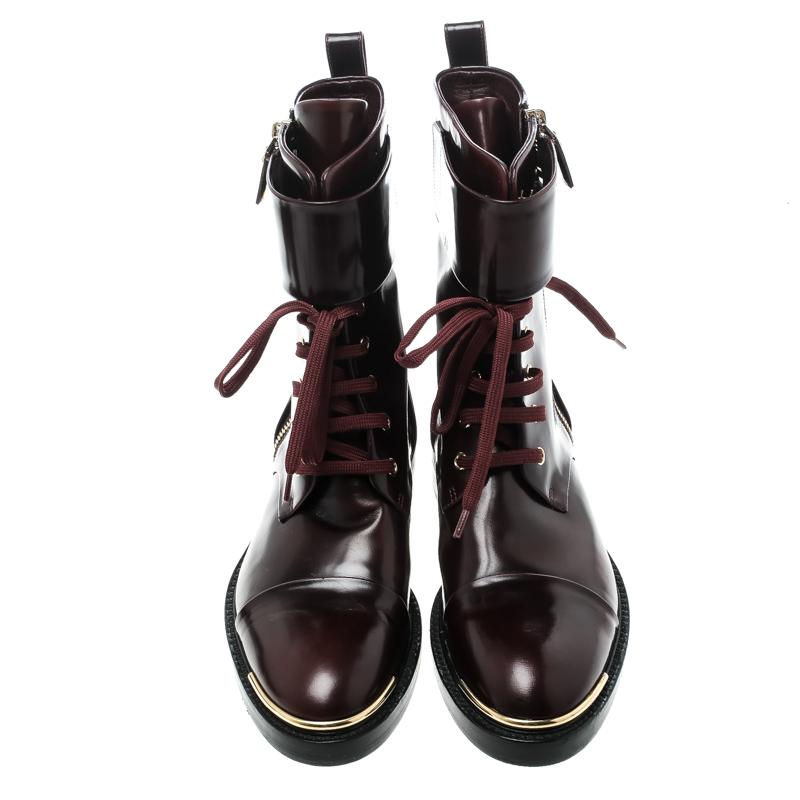 You will always be style-ready when you flaunt these gorgeous Ranger boots by Louis Vuitton. Crafted from leather, they feature a lace-up front, zip details, and comfortable insoles. They've been beautified with gold-tone accents and a belted