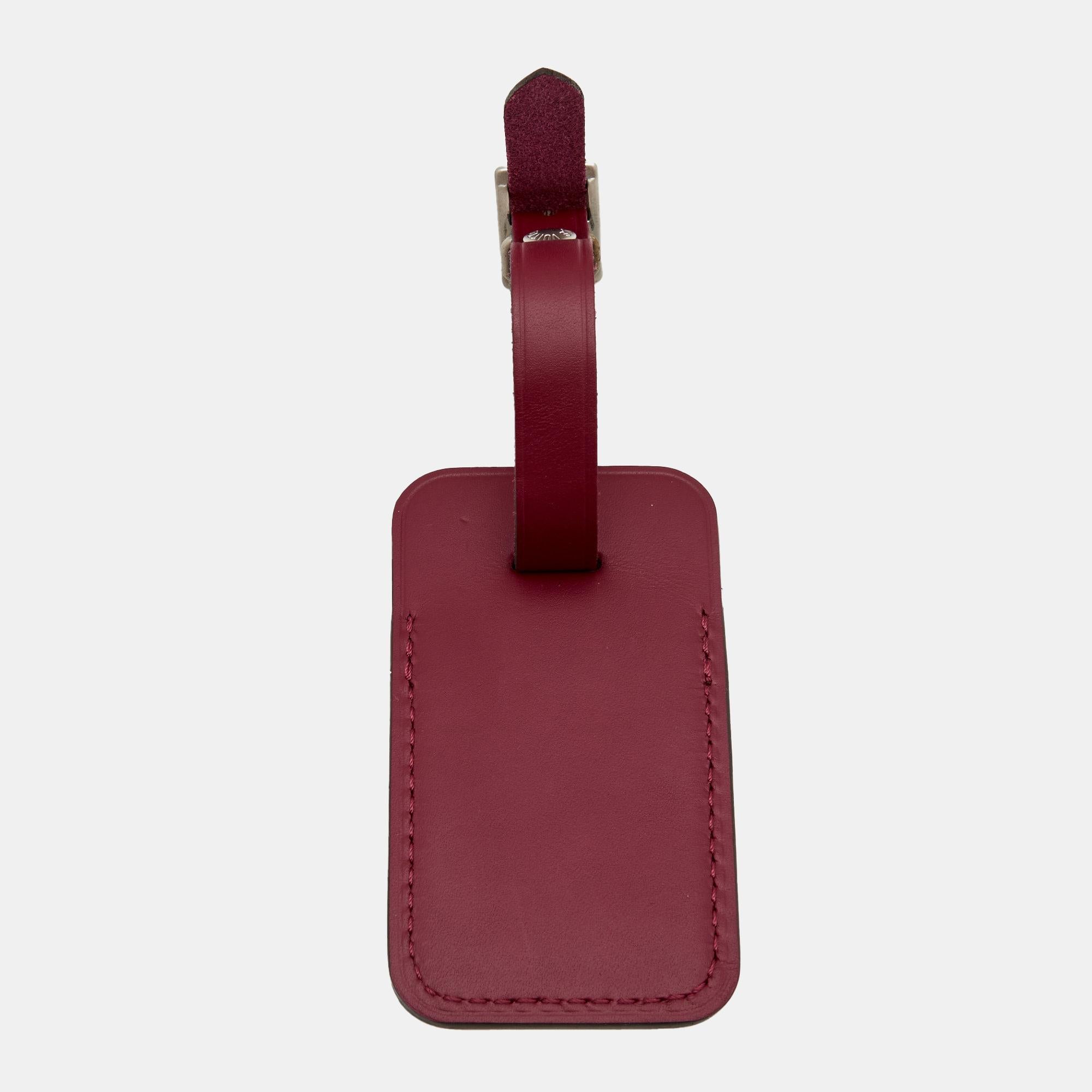 Make your luggage easy to spot and identify (while also looking uber-chic, of course!) thanks to Louis Vuitton's luggage tag - rendered in a subtle burgundy hue. Crafted from leather, this accessory can easily be looped and adjusted onto your