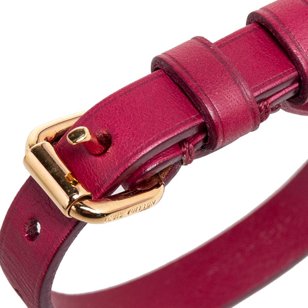 A simple burgundy bracelet by Louis Vuitton made from leather and detailed with a gold-tone buckle fastening. It has a comfortable fit.

Includes: Original Dustbag