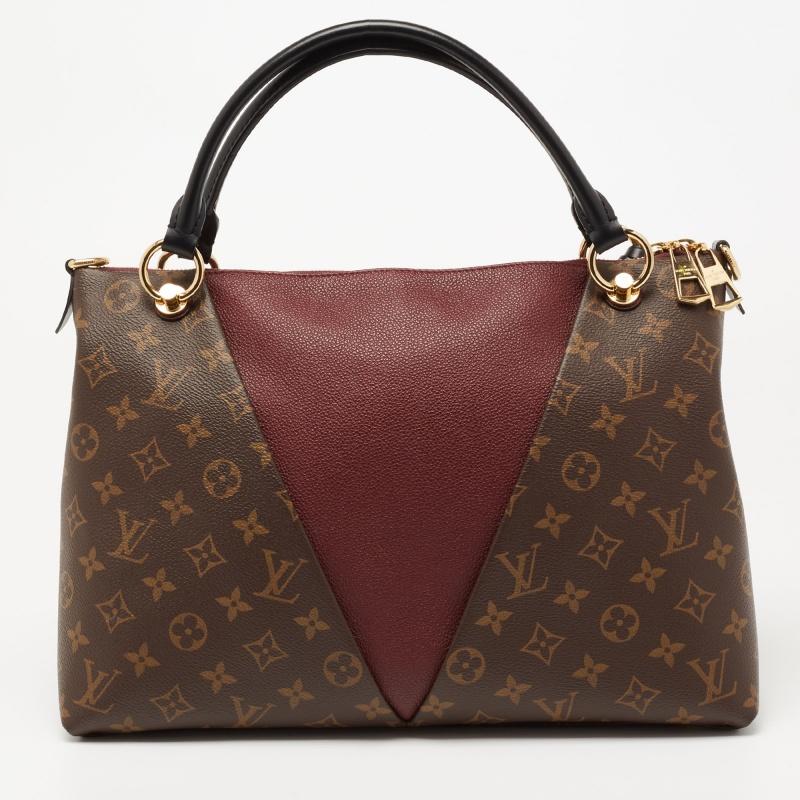 This Louis Vuitton bag promises to take you through the day with ease, whether you're at work or out and about in the city. From its design to its structure, the monogram canvas and leather bag promises charm and durability. It has top handles and a