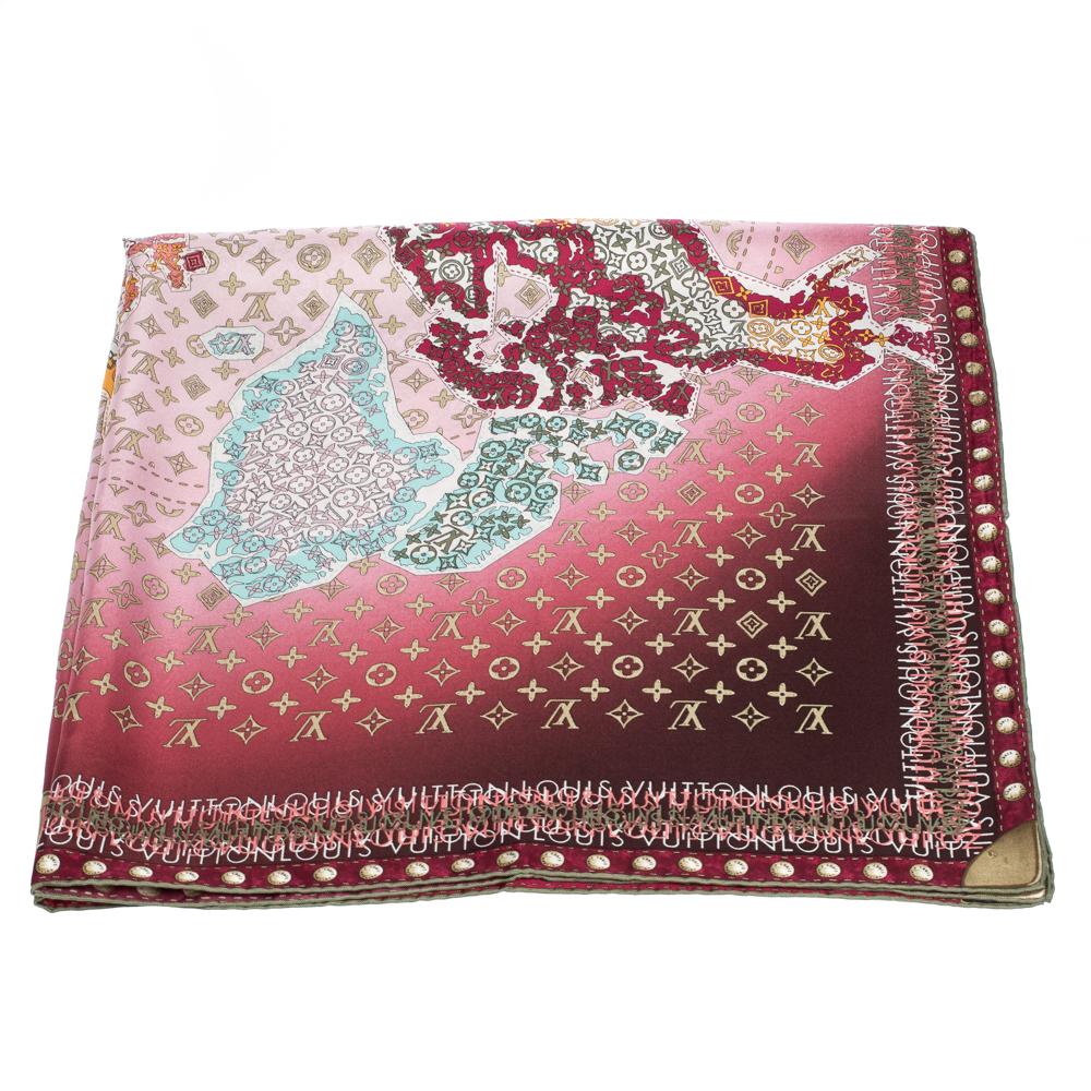 Finish your outfits with this soft square scarf by Louis Vuitton. The burgundy scarf features monogram and map prints all over. The square scarf is complete with hemmed edges and the brand label.

