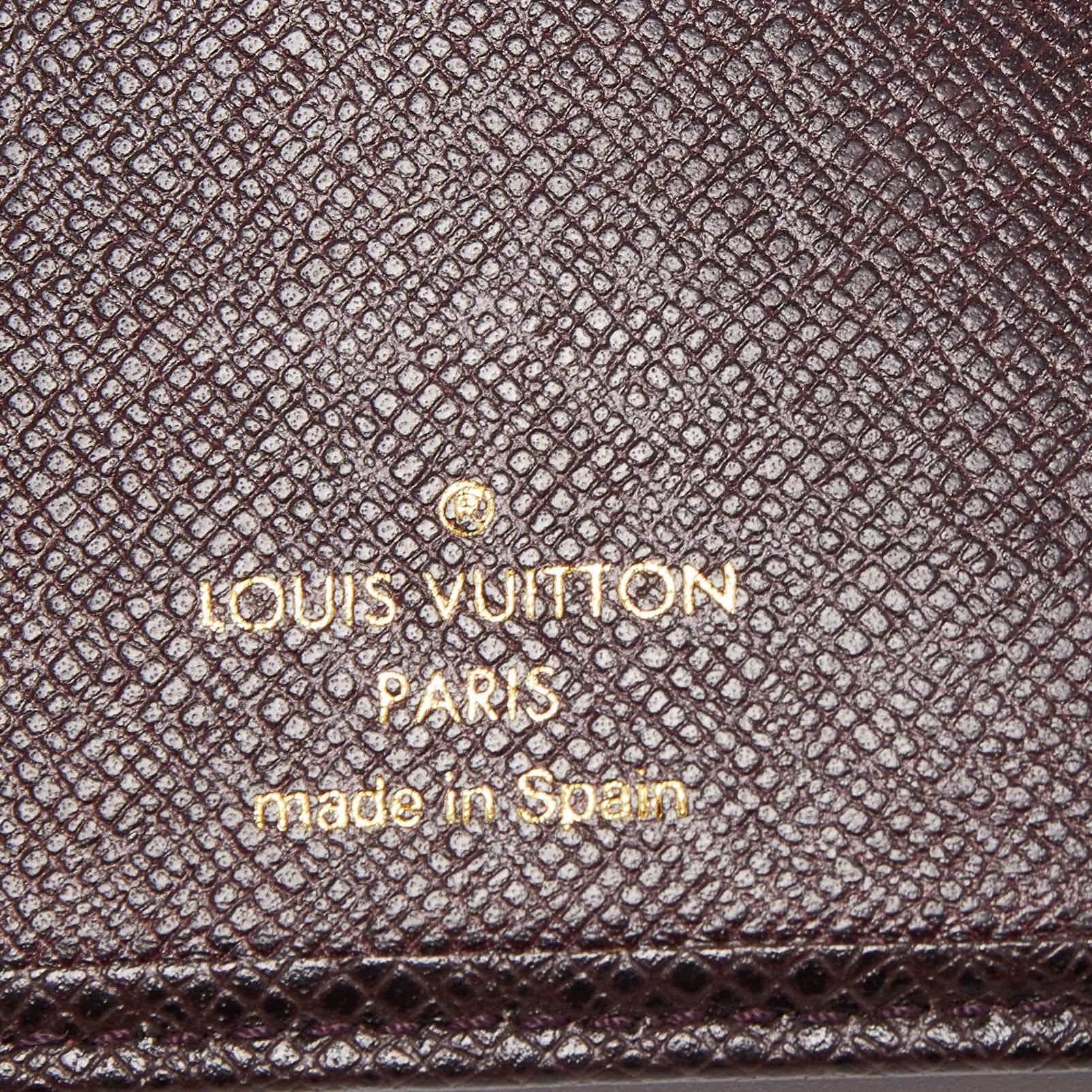 Louis Vuitton Burgunderfarbene Taiga Leder-Brieftasche zum Umklappen im Angebot 3