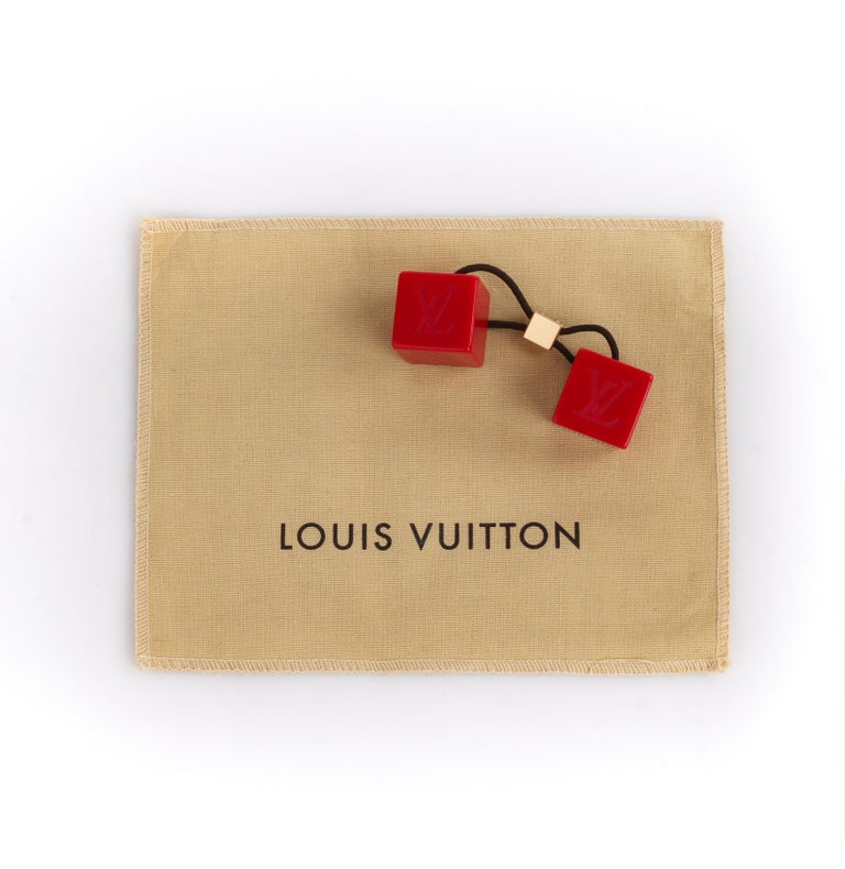 LOUIS VUITTON Burnt Red Elastic Gold LV Hair Cubes at 1stDibs louis
