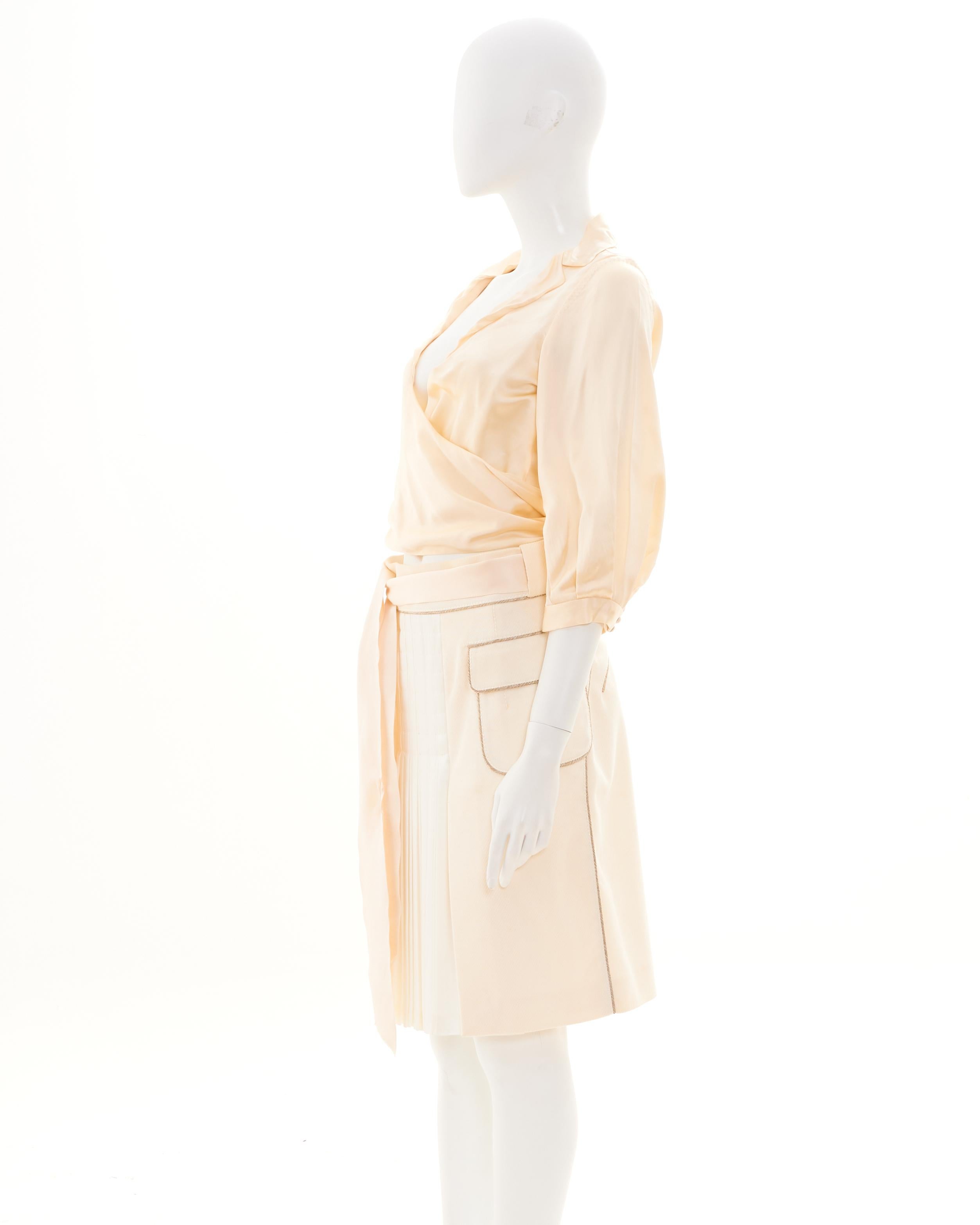 - Designed by Marc Jacobs
- Sold by Skof.Archive
- Early 00's
- Ivory Asymmetrical Top
- V-Neck 
- Mid Length Sleeves
- Midi Ivory Skirt
- Two Pockets
- Ivory Waistband
- Made in France
- Excellent Condition
- Materials: Top: 100% Viscose / Skirt: