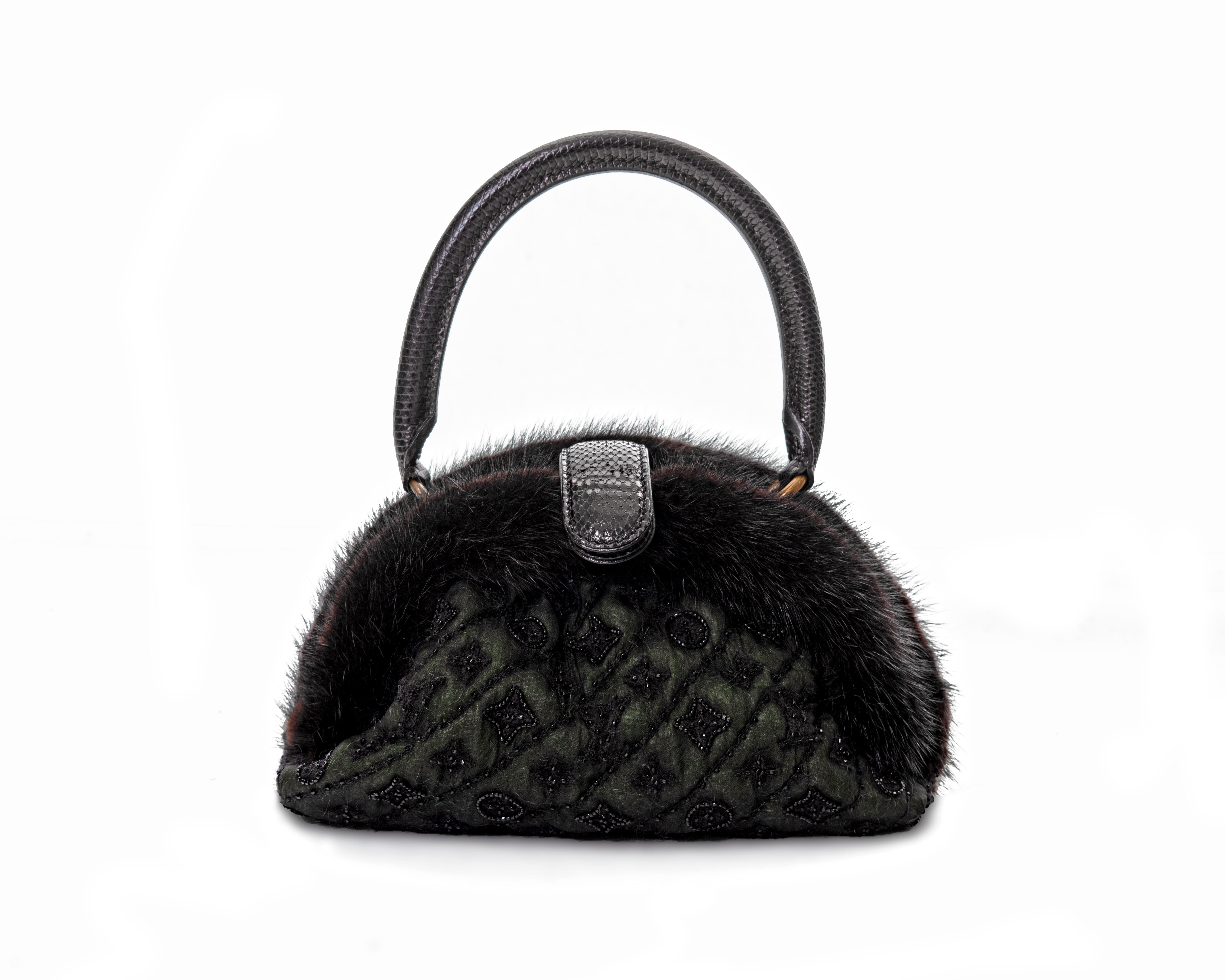▪ Louis Vuitton Mousseline Demi Lune Bag
▪ Creative Director: Marc Jacobs
▪ Fall-Winter 2005
▪ Limited Edition 
▪ Constructed from a dark green mohair with a silk muslin overlay 
▪ The House’s signature Monogram and quilting is intricately hand