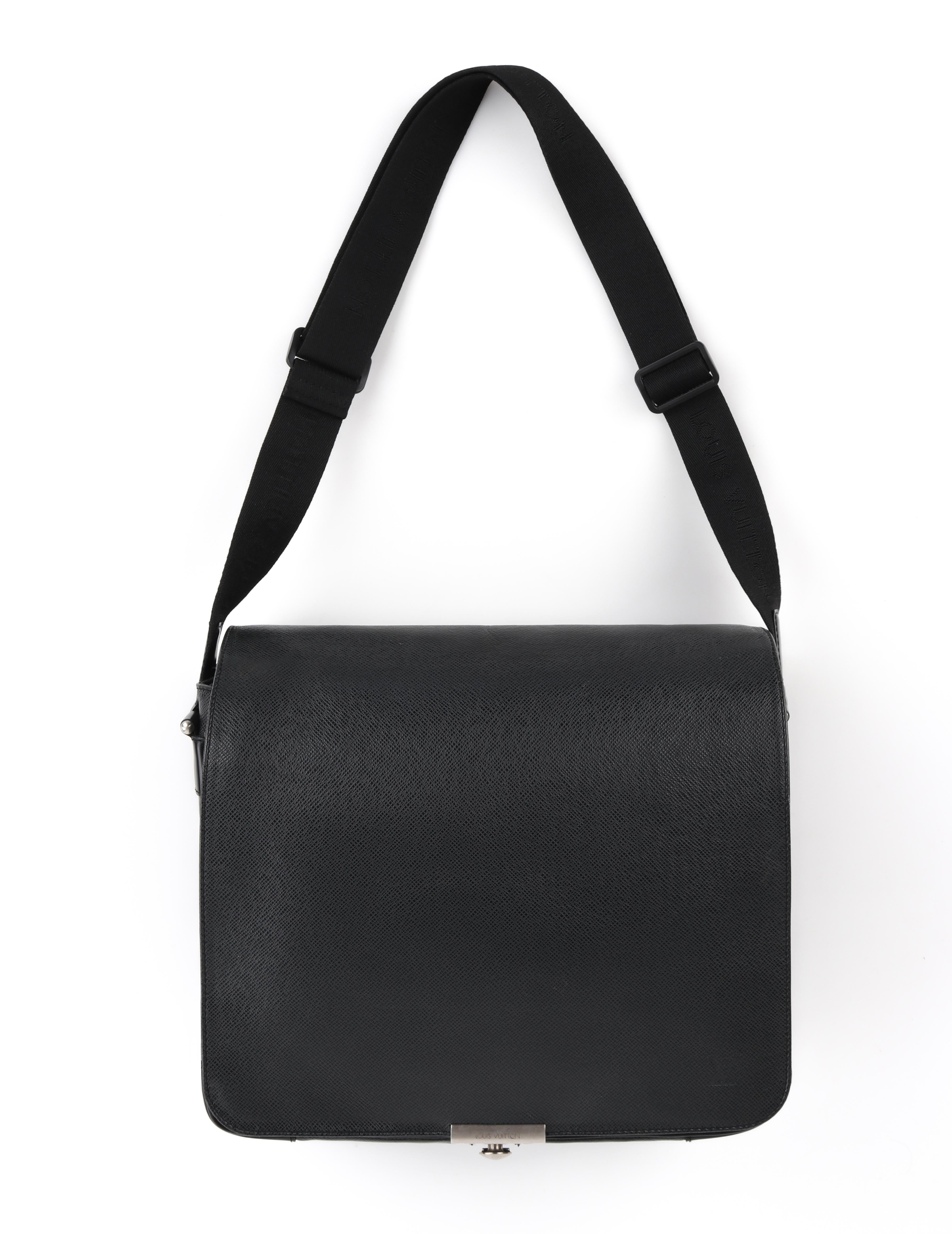 LOUIS VUITTON c. 2002 “Viktor” Black Green Taiga Leather Messenger Bag  
 
Estimated Retail: $1410	
 
Brand / Manufacturer: Louis Vuitton	
Designer: Marc Jacobs
Manufacturer Style Name: Viktor 
Style: Messenger Bag / Laptop Bag / Crossbody
Color(s):