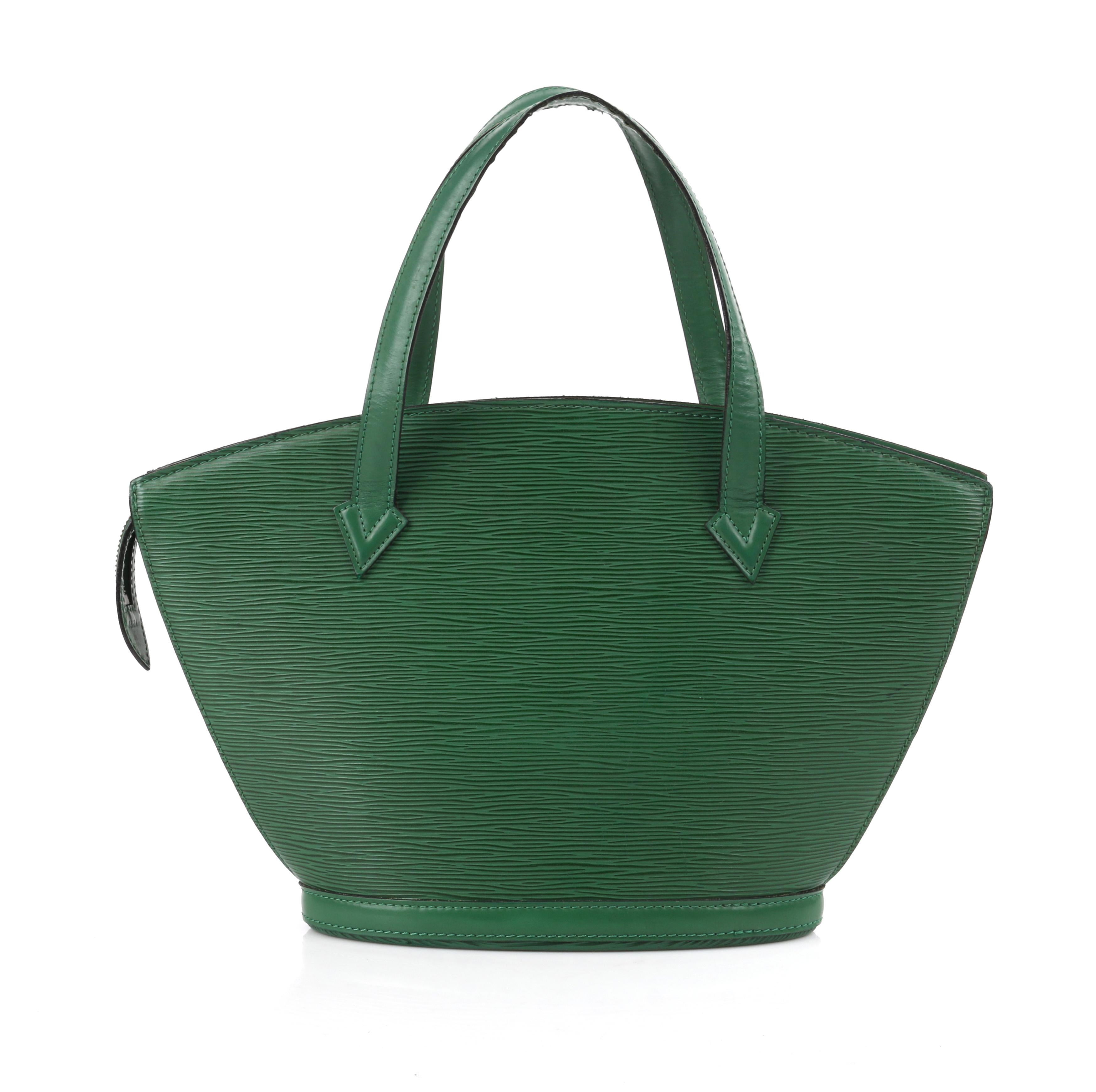 LOUIS VUITTON c.1993  “St. Jacques” Borneo Emerald Green Epi Leather Shoulder Bag Handbag 
 
Circa: 1993
Label(s): Louis Vuitton 
Style: Shoulder bag, handbag, purse
Color(s): Green 
Lined: Yes 
Unmarked Fabric Content: Epi Leather (exterior)