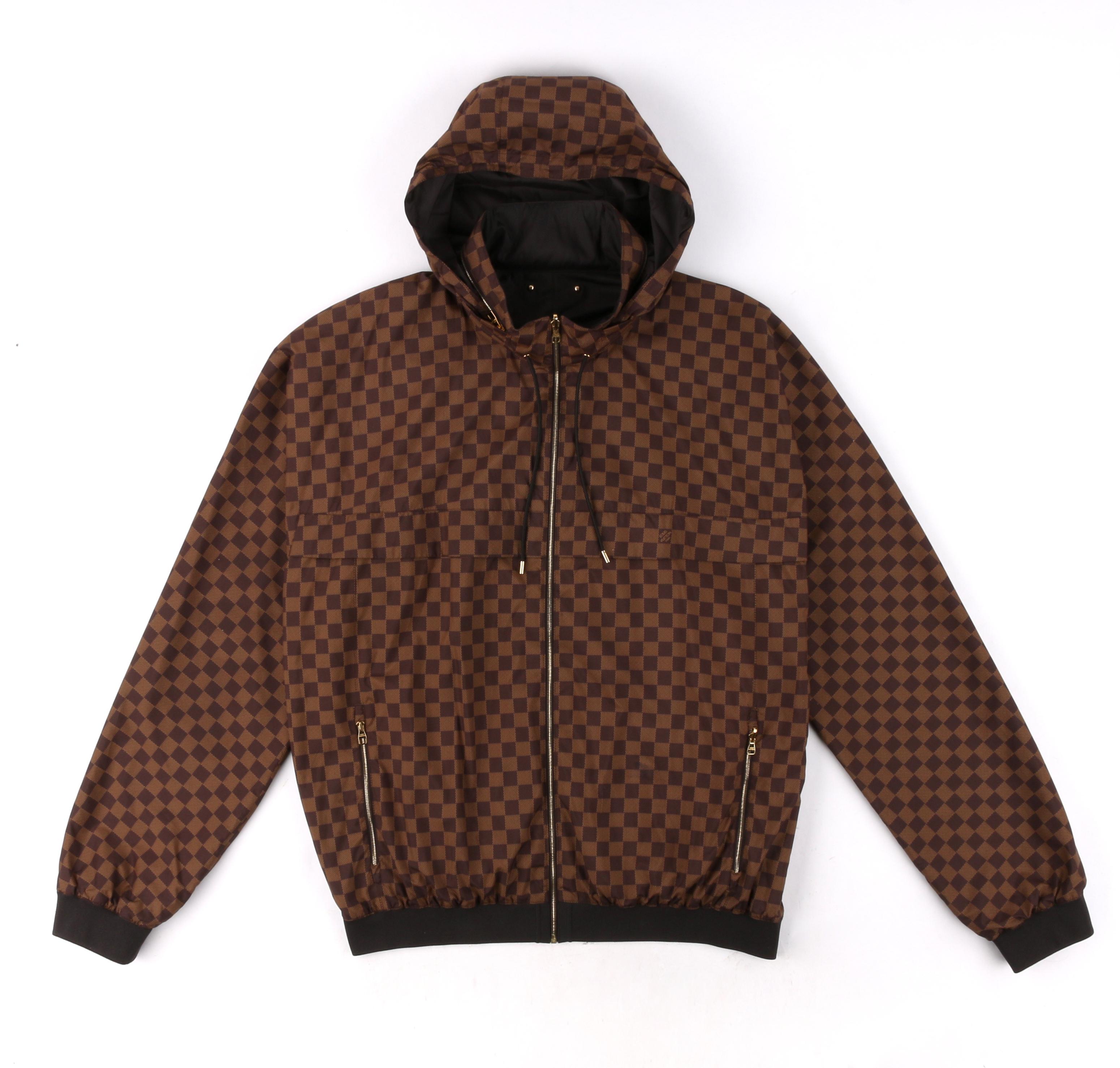 LOUIS VUITTON c.2013 Brown Damier Ebene Reversible Windbreaker Jacket 
 
Estimated Retail: $2,780
 
Brand / Manufacturer: Louis Vuitton
Manufacturer Style Name: Windbreaker 
Style: Jacket
Color(s): Shades of brown and tan
Lined: Yes      
Marked