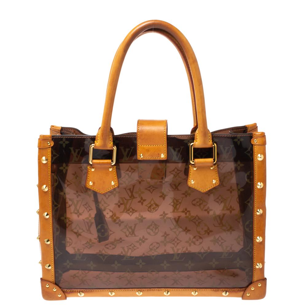 Louis Vuitton's handbags are high on style and craftsmanship, making them valuable creations of luxury. This Neo bag, like all the other handbags, is durable and stylish. Crafted from translucent, monogrammed vinyl and leather, the bag comes with