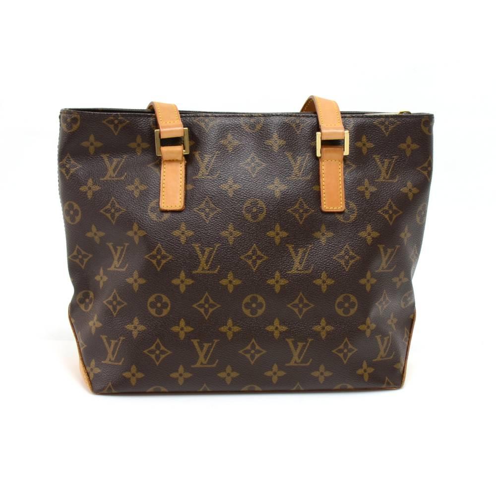 Louis Vuitton Cabas Piano shoulder bag in monogram canvas. The top has secured with zipper. Inside has 1 pocket with zipper and 1 pocket for cell phone or glasses. Comes with a D ring inside the bag seen on many Louis Vuitton items. Can be carried
