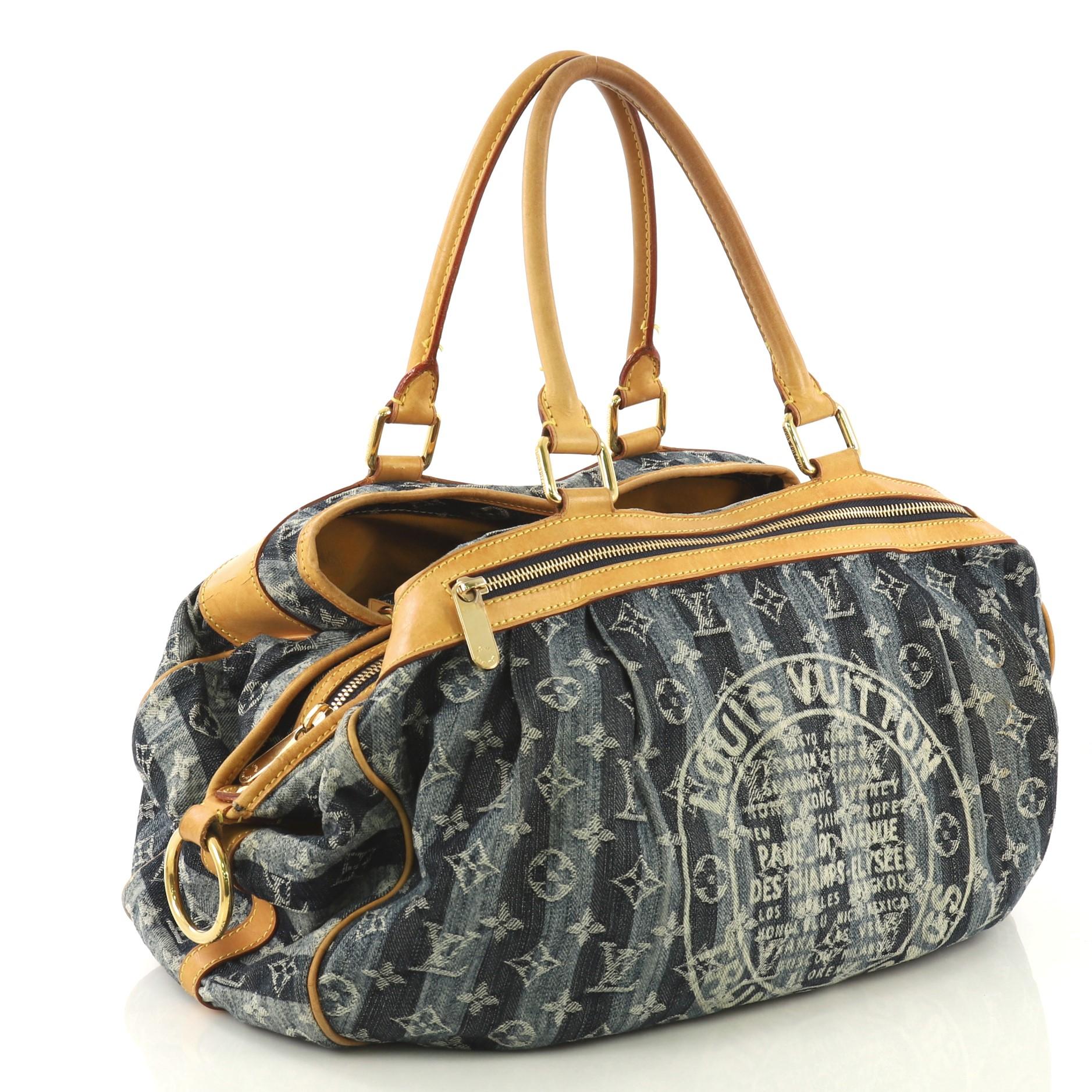 This Louis Vuitton Cabas Raye Limited Edition Denim GM, crafted from blue denim in monogram print, features printed Louis Vuitton Trunks Bags logo, dual rolled vachetta leather handles, and gold-tone hardware. Its zip and magnetic snap closures open