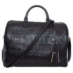 Louis Vuitton, Calfskin embossed speedy cube 30 in black