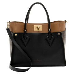 Louis Vuitton Calfskin Monogram Canvas On My Side MM Tote