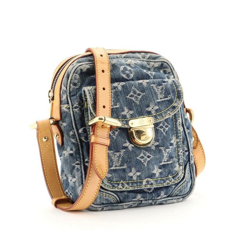 Condition: Fair. Darkening, wear, scuffs and watermarks on leather trims and strap, moderate wear and discoloration on exterior. Creasing on strap, pen marks on interior base, scratches and discoloration on hardware. 
Accessories: No Accessories