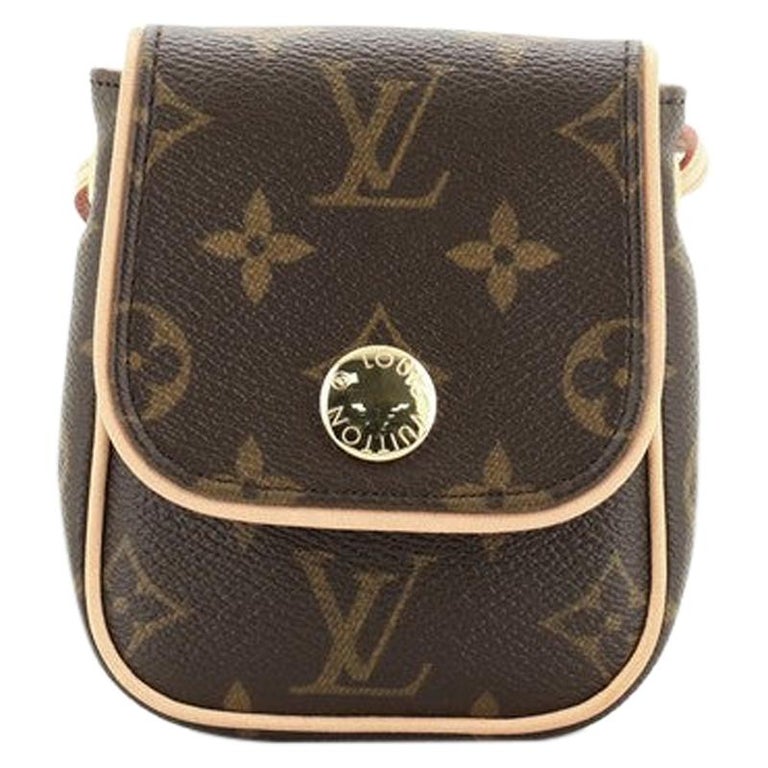 Louis Vuitton Cancun Canvas Clutch Bag (pre-owned) in Brown