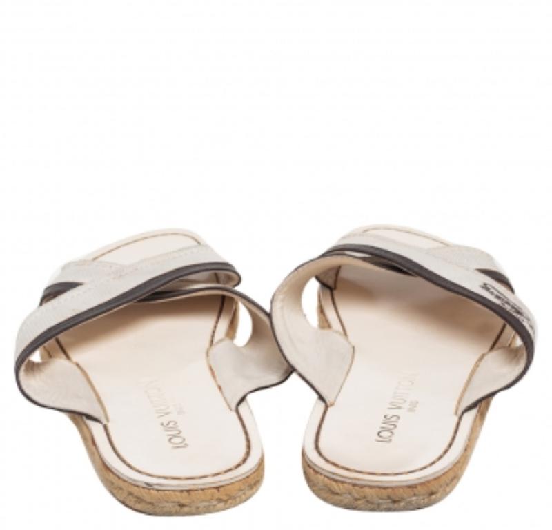 Louis Vuitton Canvas and Leather Logo Cross Strap Flat Sandals Size 41 In Fair Condition In Dubai, Al Qouz 2