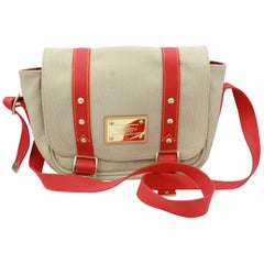 Louis Vuitton Canvas Messenger Bag.