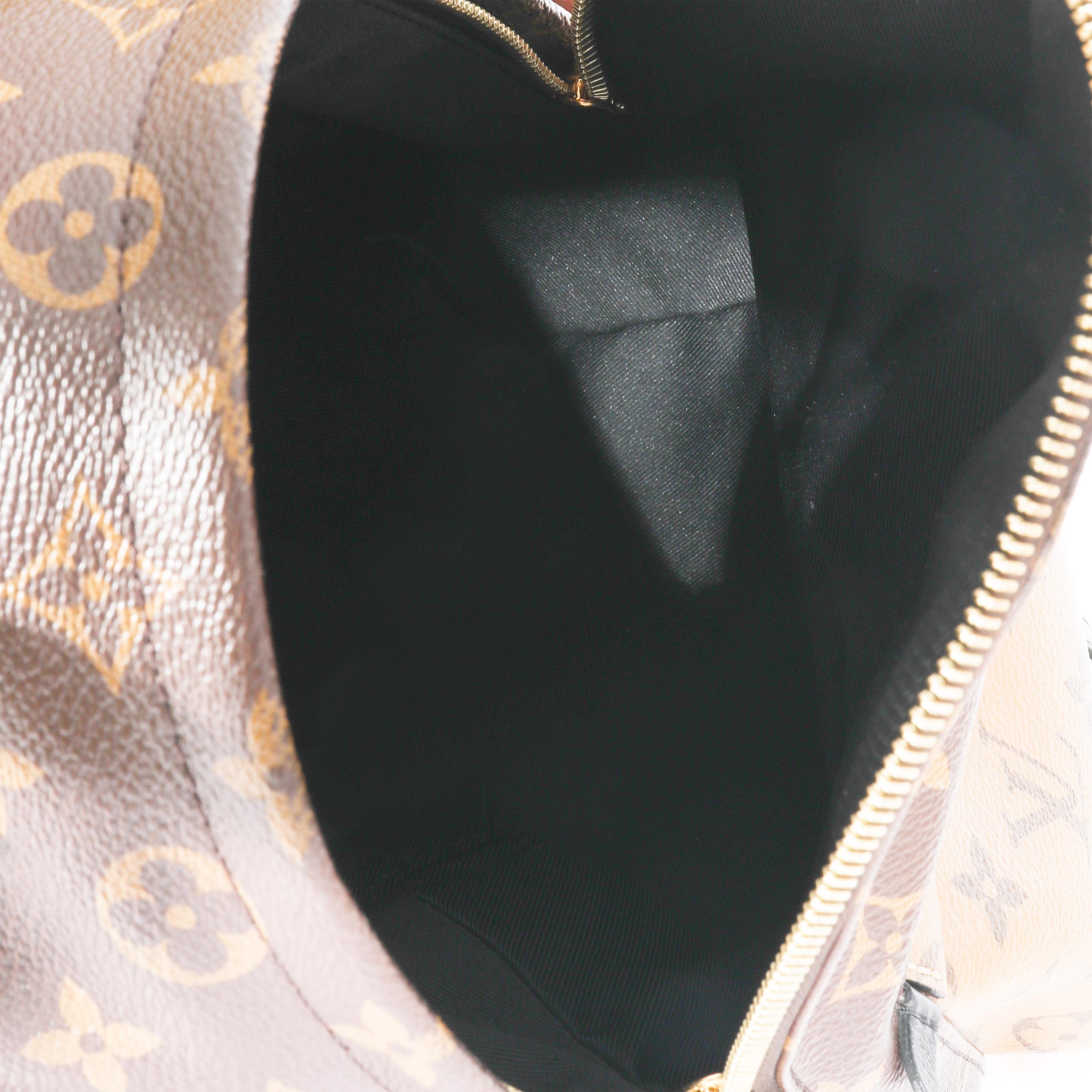 Listing Title: Louis Vuitton Canvas Reverse Monogram Palm Spring PM
 SKU: 128647
 MSRP: 2570.00
 Condition: Pre-owned 
 Handbag Condition: Very Good
 Condition Comments: Very Good Condition. Exterior corner scuffing and at straps. Scratching at