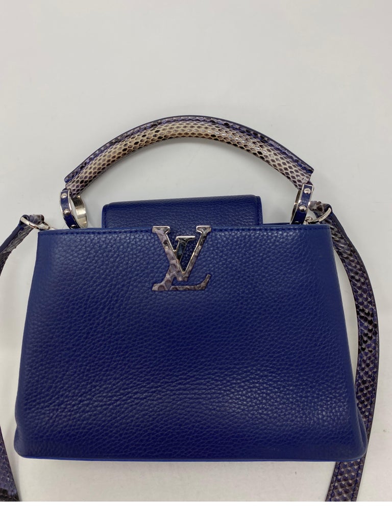 Louis Vuitton Capucine Blue Python Bag. Beautiful blue leather bag with python handles and strap. Exotic leather bag is rare and limited. Mint condition like new. Silver hardware. Collector's piece. Guaranteed authentic. 
