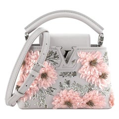 Mini-Tasche von Louis Vuitton Capucines aus Leder mit Lederverzierung