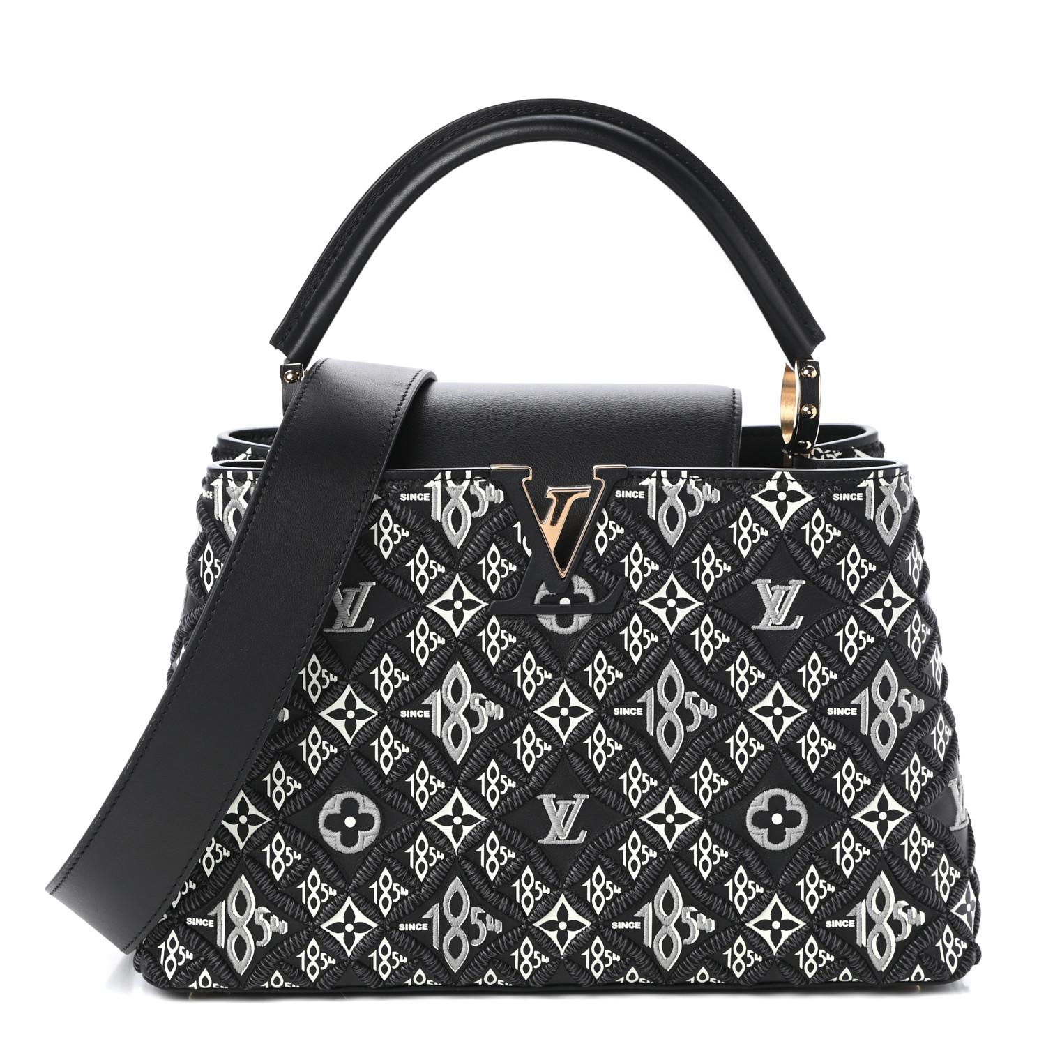 Authentic, pre-owned Louis Vuitton Capucines Limited Edition Since 1854 Monogram Calfskin bag. Elevate your collection with the Louis Vuitton Capucines bag, a truly exquisite piece. This rare, limited-edition design features embroidered Since 1854