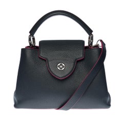 Umhängetasche Capucines BB aus marineblauem Taurillon-Leder von Louis Vuitton, SHW