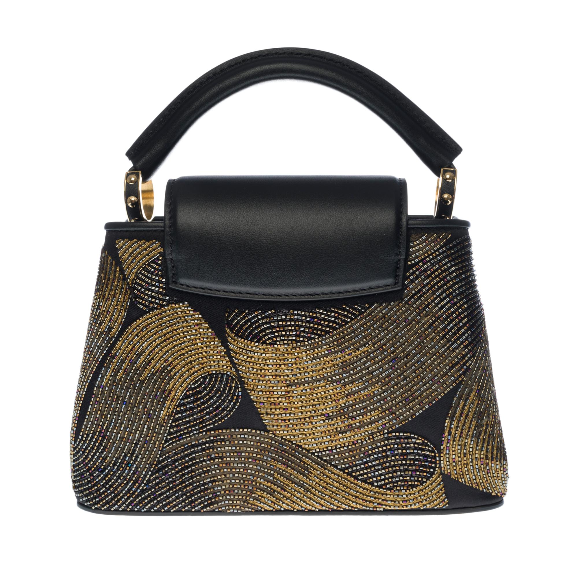 Ultra Exclusive- Capucines Mini Cruella

This Capucines Mini bag is a masterpiece of Louis Vuitton know-how. Iridescent black beads are embroidered by hand using threads of different metallic colors evoking a 3D pattern effect brush stroke or gold