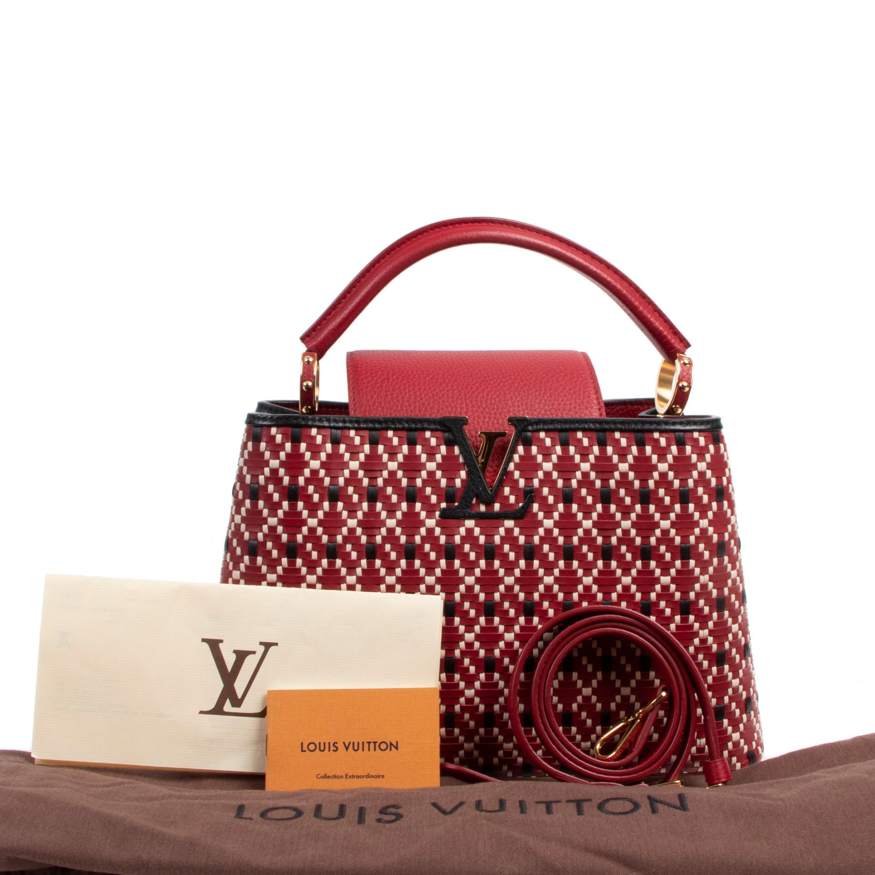 Excellent condition 

Louis Vuitton Capucines PM Twiny Rouge Bag 

This imited edition bag from Louis Vuitton is truly a piece of art you won't regret buying. The Capucines handbag features a flap that can be worn inside the bag to showcase the