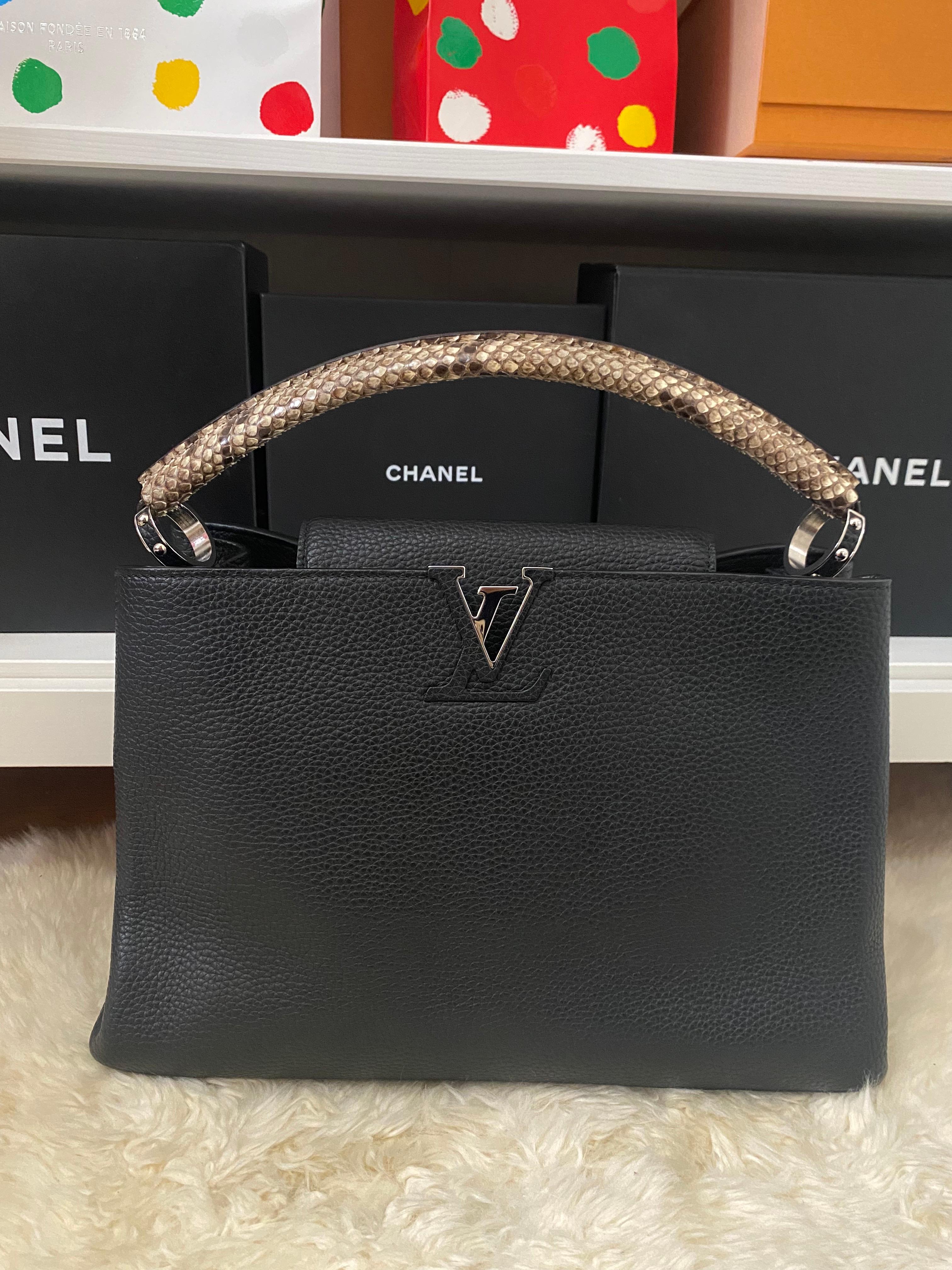 Louis Vuitton Capucines Python Handle MM
Exterior Color: Black
Interior Color: Black
Exterior Material: Leather, Python, Exotic
Interior Material: Leather
Hardware Color: Silver
Accessories: No Accessories
SIZE AND FIT: 14