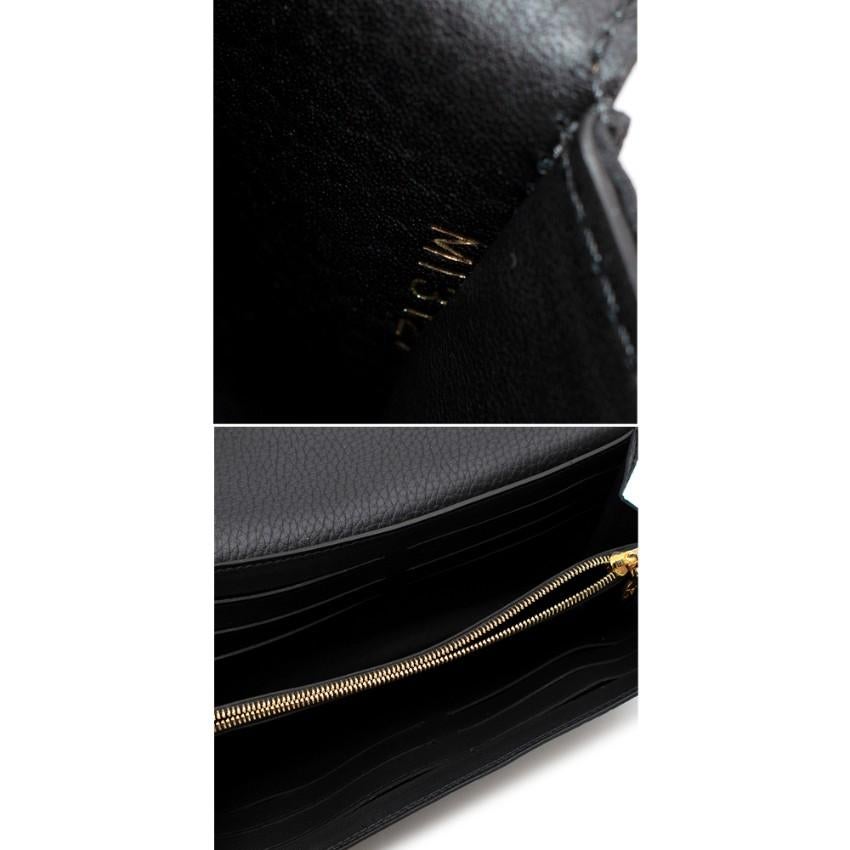 Louis Vuitton Capucines Taurillion Leather Fleur De Monogram Wallet For Sale 5