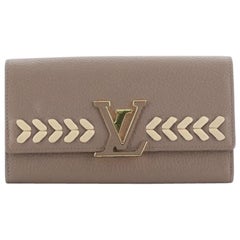 Capucines leather wallet Louis Vuitton Navy in Leather - 33381180