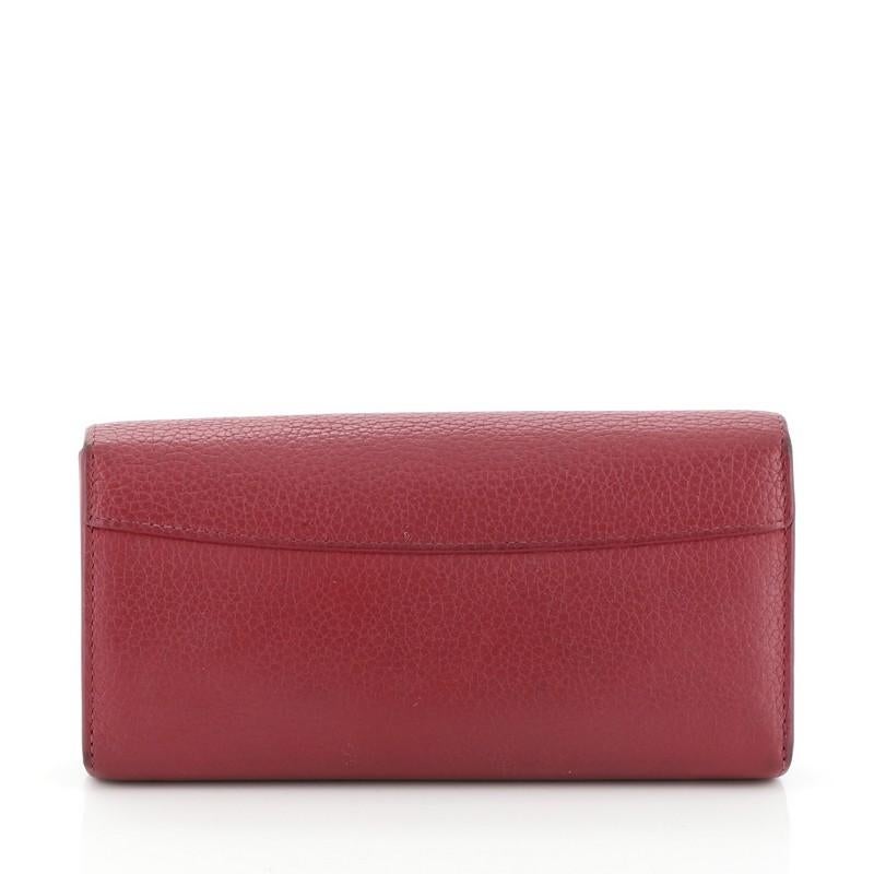 Brown Louis Vuitton Capucines Wallet Studded Leather