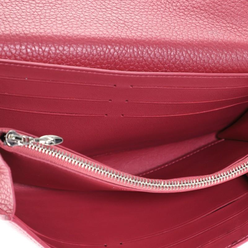 Women's or Men's Louis Vuitton Capucines Wallet Studded Leather