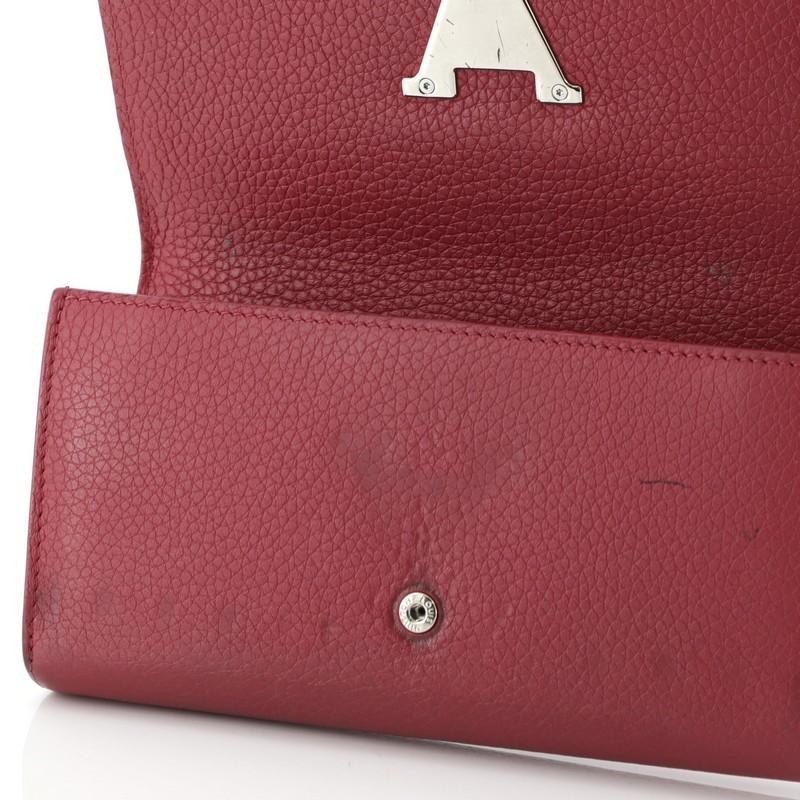 Louis Vuitton Capucines Wallet Studded Leather 2